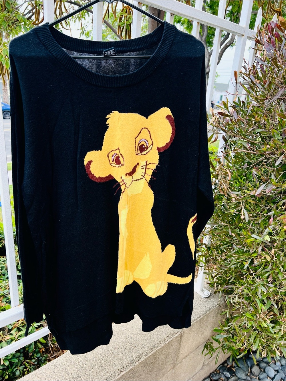 Disney Black Sweater with Yellow Lion Cub Graphic
Smoke free home